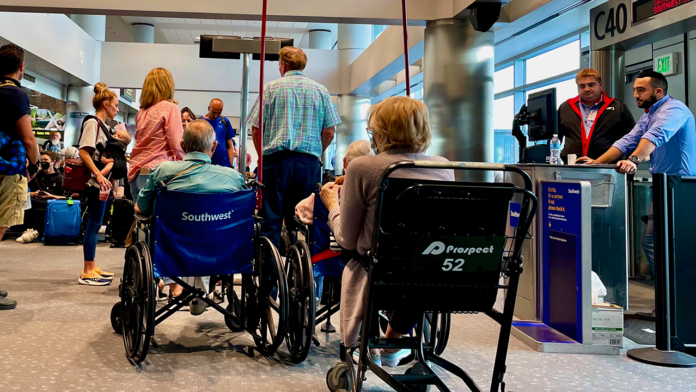 Florida flyer sparks debate after showing '30 pre-board' Southwest passengers Florida flyer sparks debate after showing '30 pre-board' Southwest passengers in wheelchairs