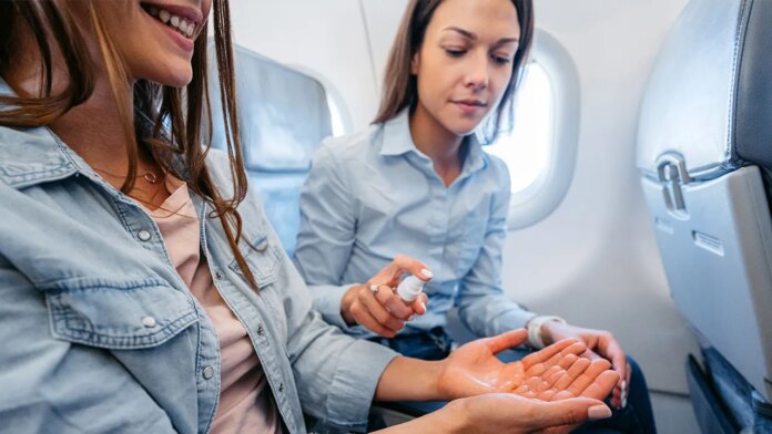 Flight passenger says flyer 'sprays the air' with disinfectant: 'People all around are coughing'