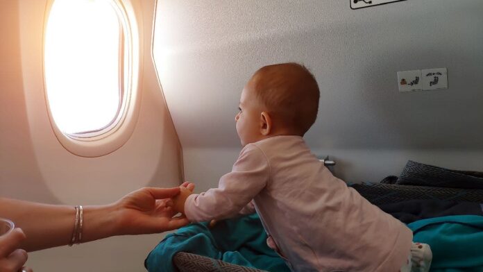 Seat-swapping family guilts flight passenger into changing spots over baby