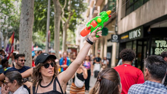 Barcelona locals protest tourists with water guns amid overtourism concerns
