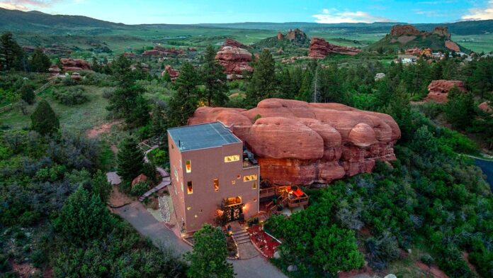 Colorado's $1M 'rock house' integrates 200-million-year-old red rocks into its design