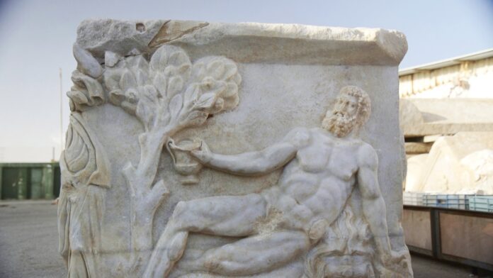 Roman sarcophagus with Dionysus-Hercules drinking game found in Israel