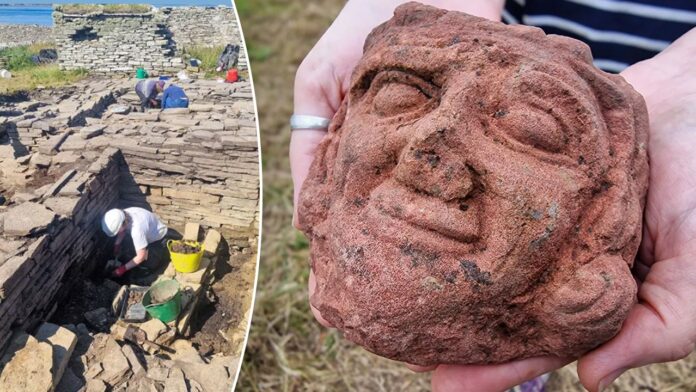 Ancient carved head discovered by student at Scottish island excavation