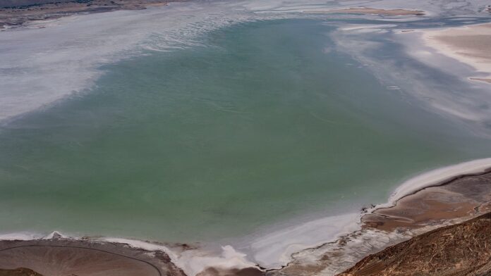 Ancient lake returns to Death Valley after rare record rainfall