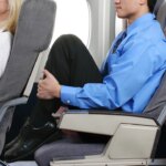 Viral airplane sleep trend sparks safety concerns as passengers pull feet onto seats Viral airplane sleep trend sparks safety concerns as passengers pull feet onto seats