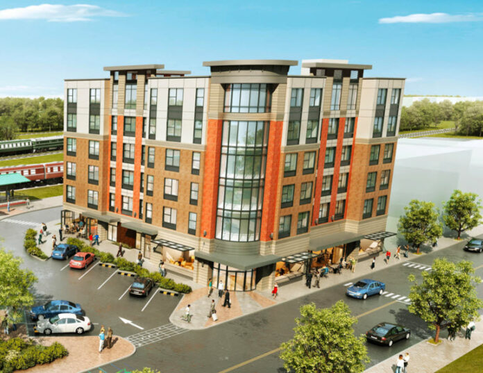 Modern multi-story building with parking.