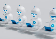 The Benefits of Using Chatbots for Lead Generation Four robots working on laptops