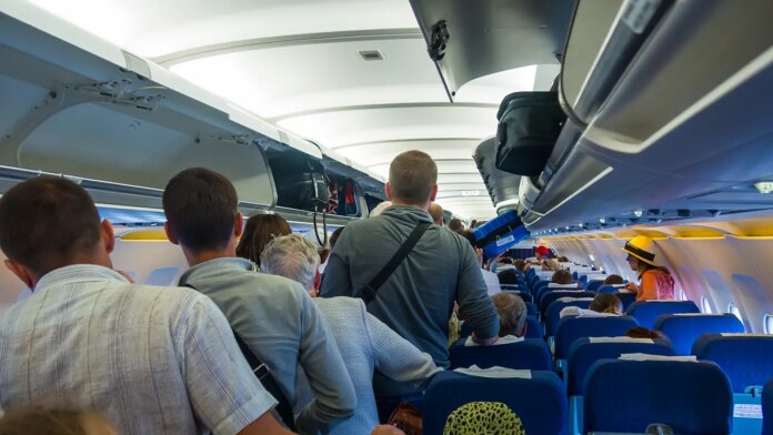 Plane etiquette expert warns against standing immediately after landing Plane etiquette expert warns against standing immediately after landing