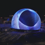 Sphere Las Vegas is expanding to National Harbor Maryland with groundbreaking venue Las Vegas, Nevada - August 2024: Aerial view of designs on the Sphere in Las Vegas. This 17,600 seat music and entertainment venue is the largest spherical structure on Earth. Special FAA authorization was obtained for this drone flight in restricted airspace.