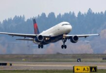 Passengers have a fright as Delta flight engine failure sparks fire at airport Passengers have a fright as Delta flight engine failure sparks fire at airport