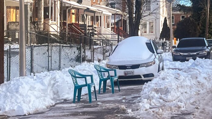 Police warn that using parking 'space savers' after snow shoveling Police warn that using parking 'space savers' after snow shoveling is illegal