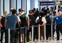 Houston man hands out free vodka shots during four-hour TSA line wait at airport Houston man hands out free vodka shots during four-hour TSA line wait at airport
