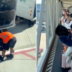 Crowd cheers as airport workers finally collapse stubborn baby stroller Crowd cheers as airport workers finally collapse stubborn baby stroller